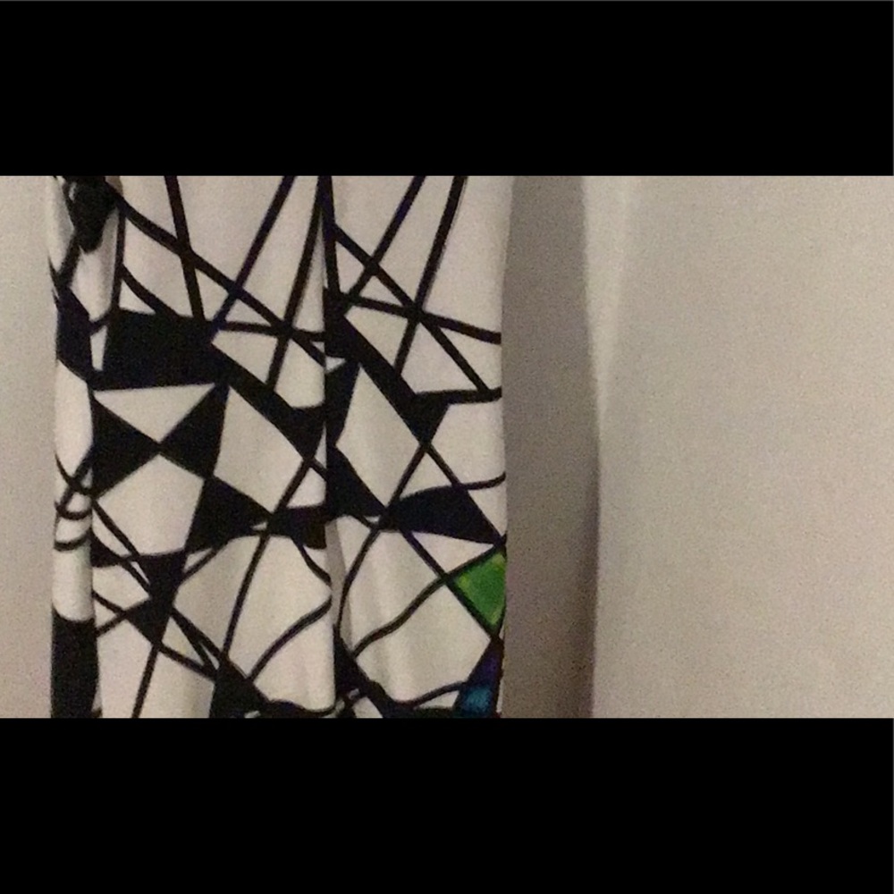 95% polyester, 5% elastane
Slightly worn
Excellent condition - Picture 3 of 3
